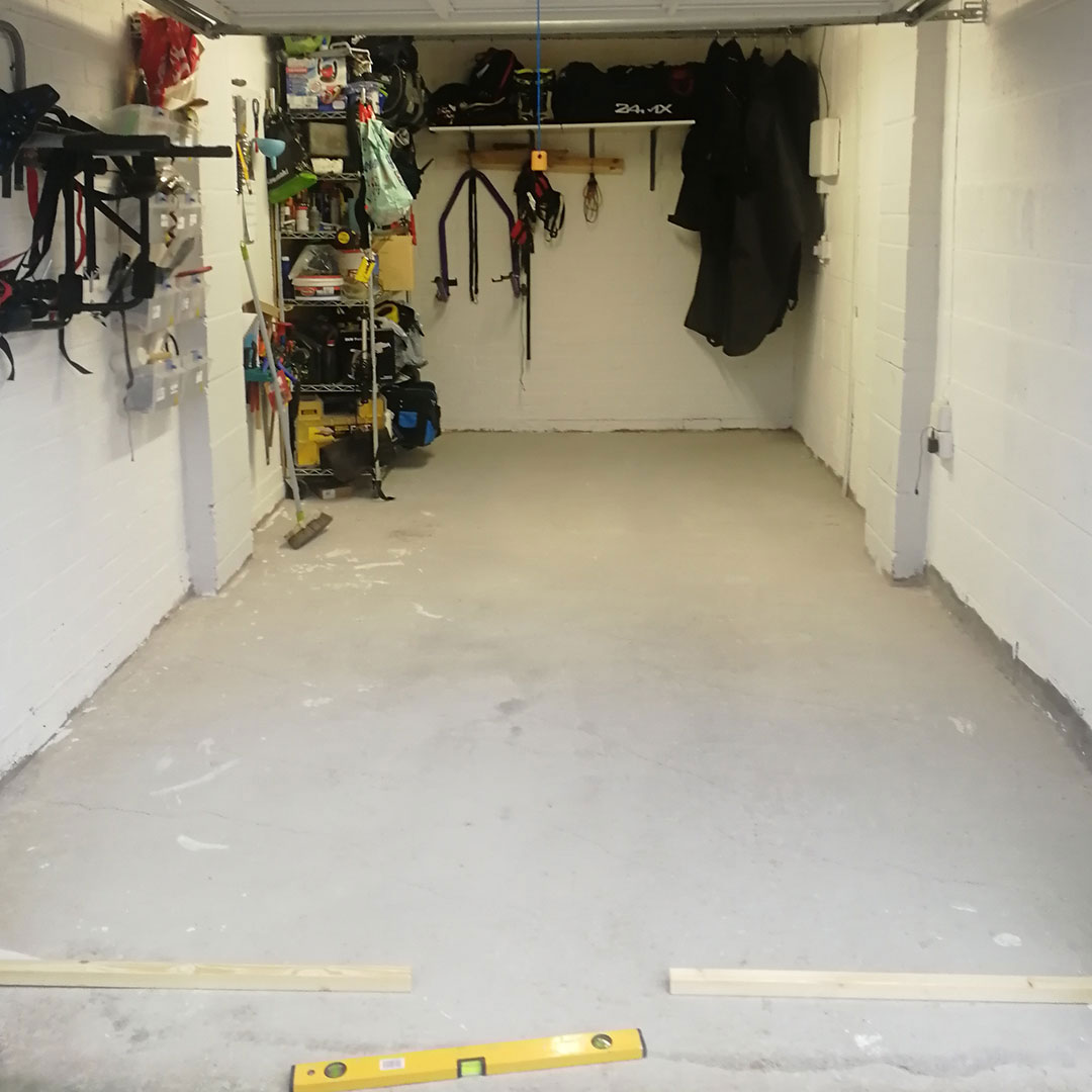 Before photo of garage floor
